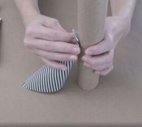 5 quick and easy steps to make a wrapping paper christmas tree, Taping the first cone onto the cardboard tube