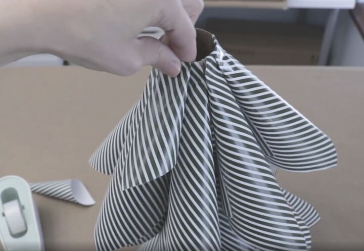 5 quick and easy steps to make a wrapping paper christmas tree, Adding a layer of smaller wrapping paper cones