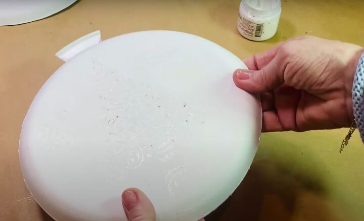 how to make an adorable tie dye paper plate ornament craft, Dried but tacky gel medium on paper plate