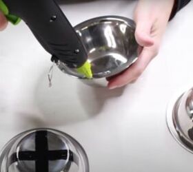 8 simple steps on how to make giant jingle bells, Adding hot glue to the rim of a mixing bowl