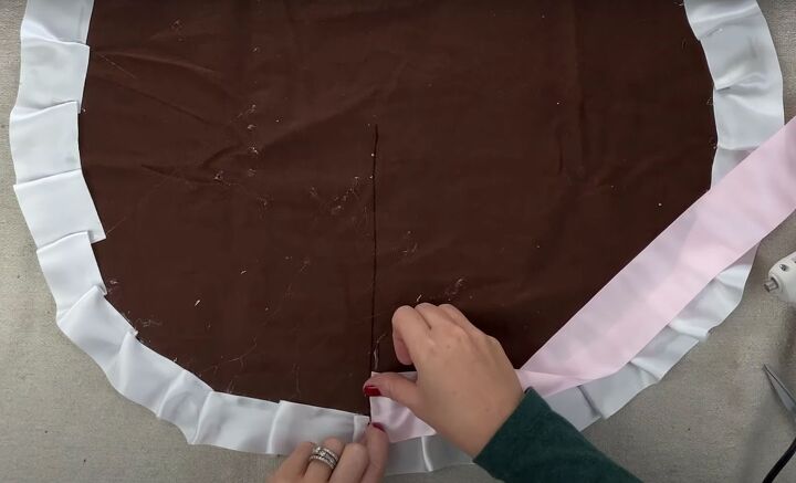 how to diy a mini christmas tree skirt no sewing needed, Overlapping a second layer of ribbon over the first layer