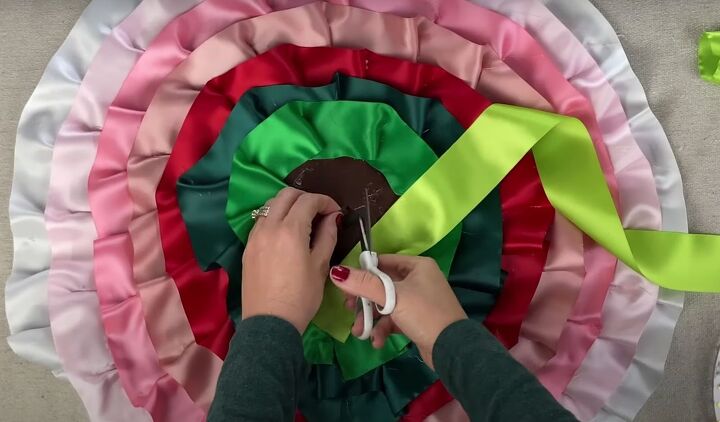 how to diy a mini christmas tree skirt no sewing needed, Cutting a hole in the center of the fabric