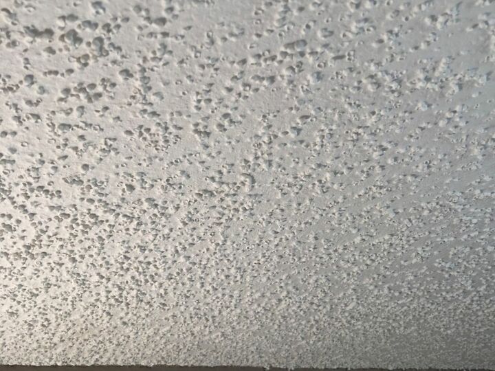 how to remove popcorn ceiling and when you shouldn t try it yourself, close up of white popcorn ceiling