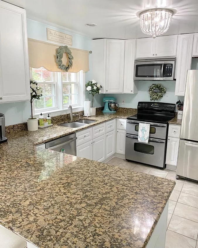 how to clean and disinfect granite countertops, granite countertops in kitchen with white cabinets
