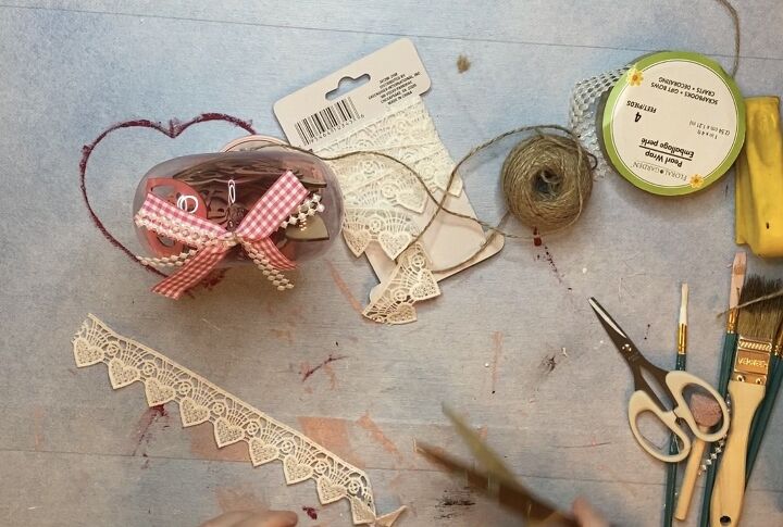 dollar tree valentine s day gumball machine makeover, dollar tree heart gumball machine materials spread on tabletop