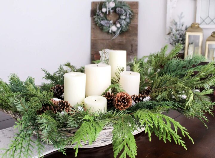 diy centerpiece with greenery and pinecones