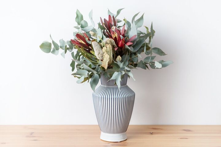 how to arrange flowers in a tall vase, flower arrangement in ribbed vase