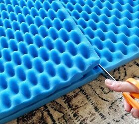 Cut an egg crate mattress into pieces for this brilliant post-holiday storage trick