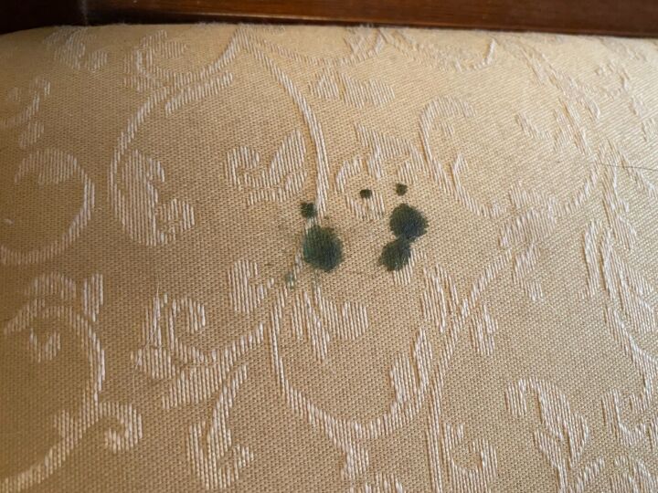 q how to remove candle wax on fabric