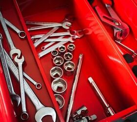how to organize a toolbox, silver tools organized in a red toolbox