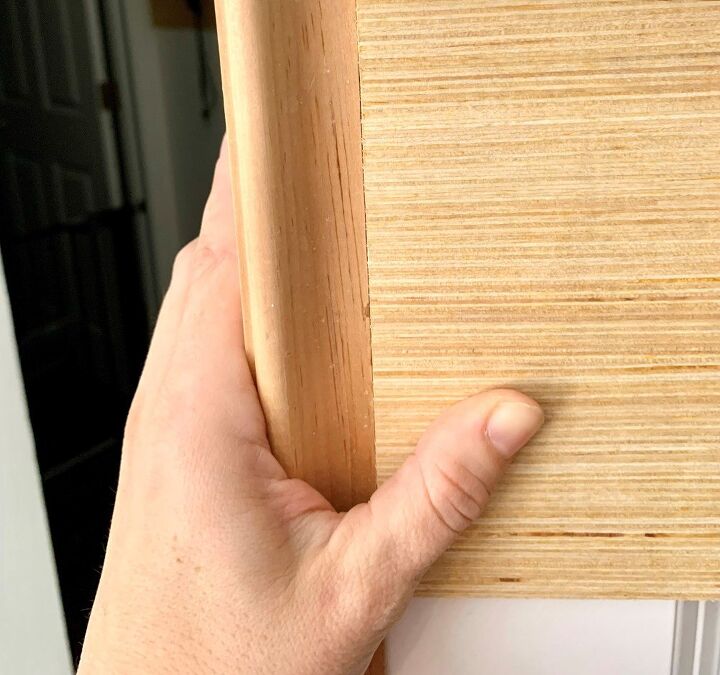 how to update a builder basic door, Line up plywood end along the attached trim