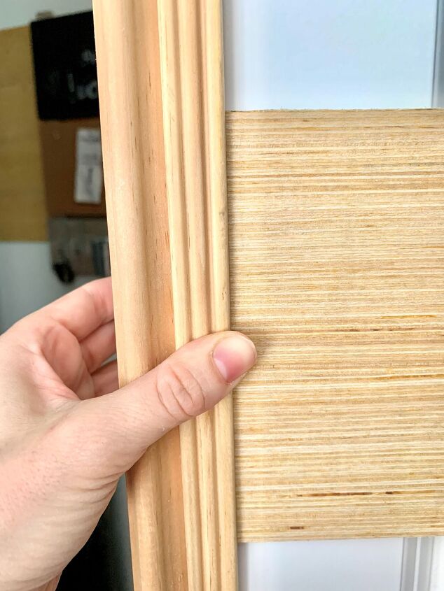 how to update a builder basic door, Attach thinner trim to hide the plywood ends