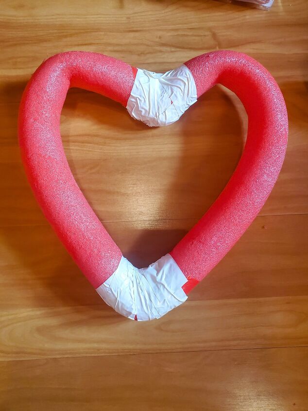 cute diy valentine s day heart shaped pool noodle wreath, Reinforce the top bottom parts with duct tape