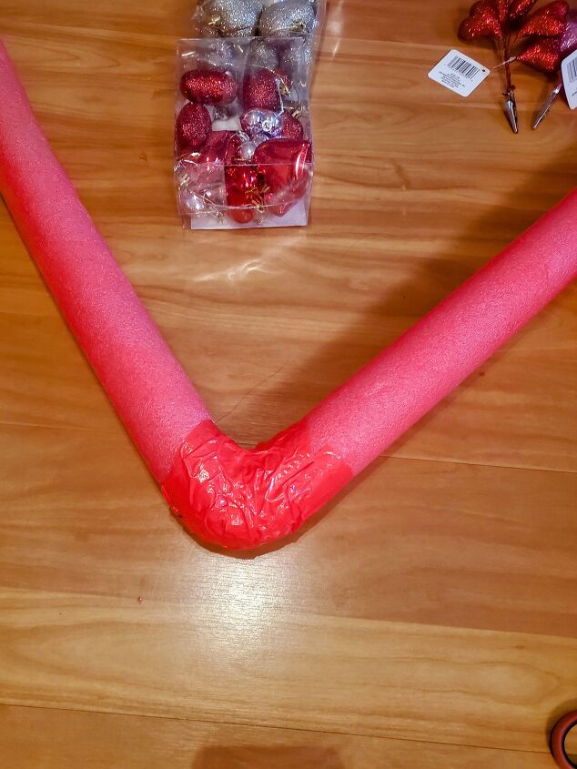 cute diy valentine s day heart shaped pool noodle wreath, Wrap with duct tape