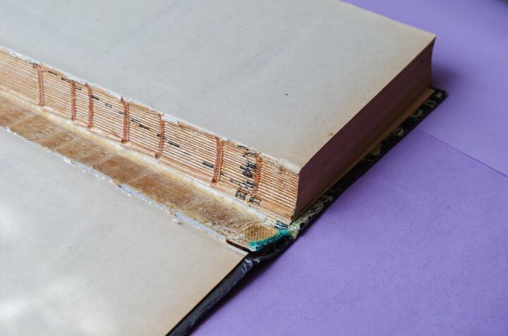 save your favorite story by learning how to repair book binding, book pages torn from spine