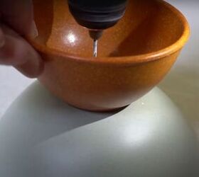 here are 6 easy steps to make the cutest bowl light for your home, Drilling through the two bowls