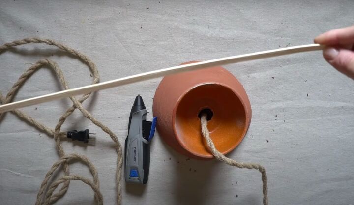 here are 6 easy steps to make the cutest bowl light for your home, A piece of thin reed to cover the seam