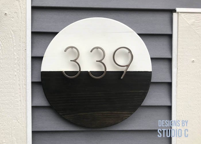 an easy to make address sign using a round piece of wood