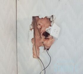 Cómo reparar un agujero grande en la pared de yeso