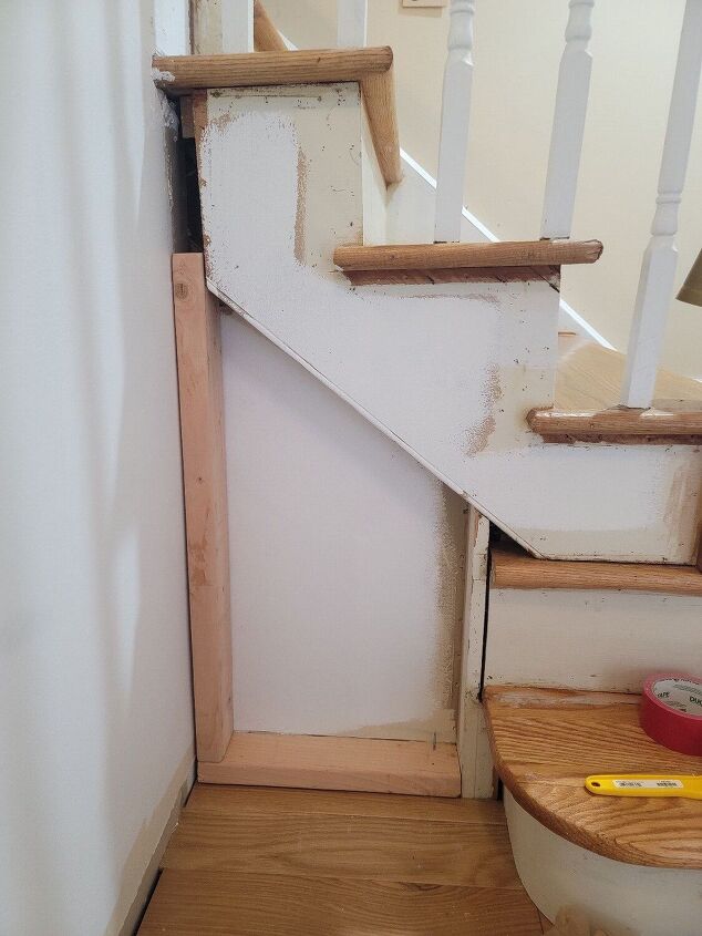 how i fixed this ugly space below my stairs