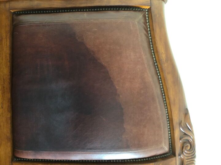 q how do i clean a large water stain from a leather headboard