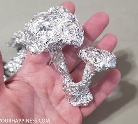 She squashes a piece of aluminum foil & puts it in her planter for this adorable idea