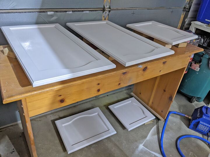 how i painted my kitchen cabinets using a hvlp spray system, Laid out to dry