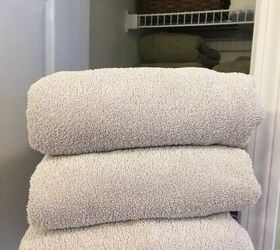 how to soften towels in 8 simple steps, stack of folded gray towels