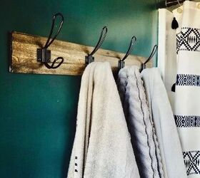 how to soften towels in 8 simple steps, three towels hanging on wood rack