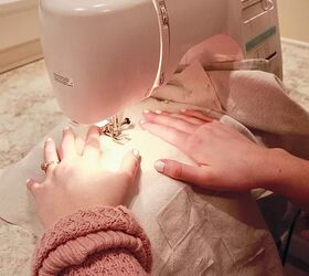 the 6 best sewing machines for every skill level, Hands running fabric through sewing machine Photo via Jessica Sara Morris