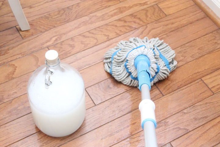 best mops, Blue mop and solution on hardwood floor Photo via Mom4Real