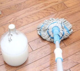 the 9 best mops to buy for squeaky clean floors, Blue mop and solution on hardwood floor Photo via Mom4Real