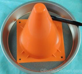 Why she glues a traffic cone onto a pie pan and then brings it outside