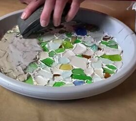 this cute diy birdbath is guaranteed to attract a few feathered friend, Adding grout over the sea glass