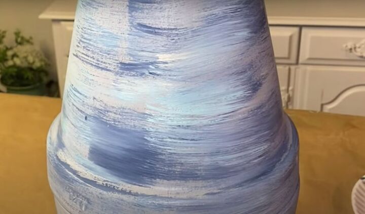 this cute diy birdbath is guaranteed to attract a few feathered friend, Dry brushed paint technique applied to the base of the DIY birdbath