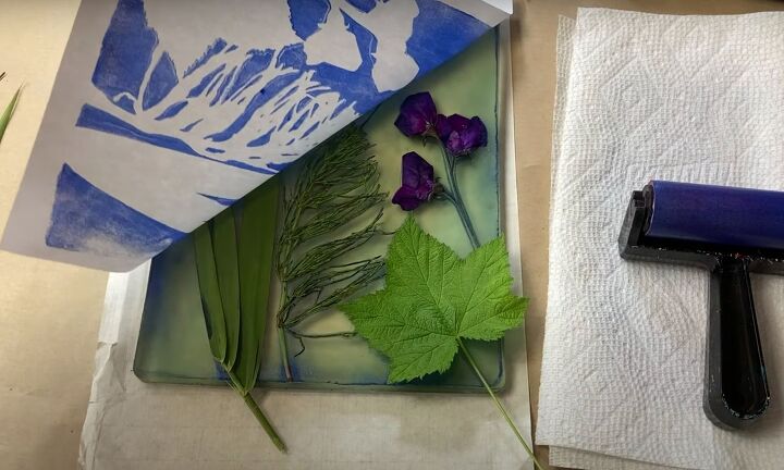 the surprisingly easy way to make your own botanical prints, Revealing the negative image of the printed greenery and flowers