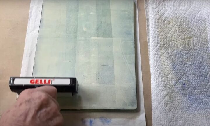 the surprisingly easy way to make your own botanical prints, Using a brayer to spread out the paint