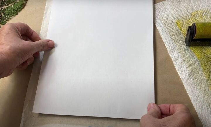 the surprisingly easy way to make your own botanical prints, Laying paper over a gel press printing plate