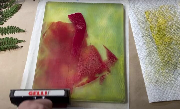 the surprisingly easy way to make your own botanical prints, Red paint on a gel press printing plate