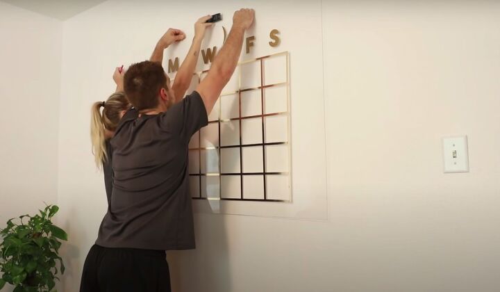 get organized how to make a stunning diy acrylic calender, Hanging the DIY acrylic calendar