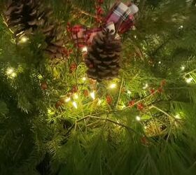 how to create this perfect pine and spruce outdoor winter planter idea, String lights added to winter planter
