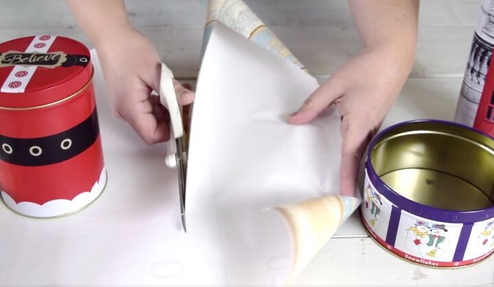 a step by step guide to decorating with upcycled cookie tins, Cutting out the measured piece of decorative contact paper