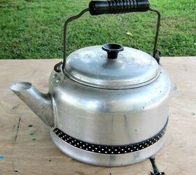 use an old tea kettle as a flower pot