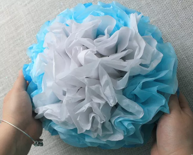how to make tissue paper flowers for endless party decor possibilities, multi colored tissue paper flower