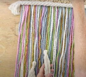here s how to make gorgeous boho rainbow wall decor, Boho yarn wall hanging