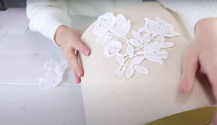 diy lampshade makeover how to create a glamorous lampshade, Placing appliques on the lampshade