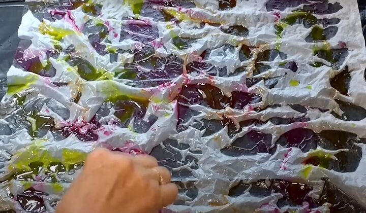 brighten storage bins with vibrant tie dyed tissue paper, Orange yellow and red dye on wet tissue paper
