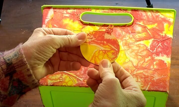 brighten storage bins with vibrant tie dyed tissue paper, Wooden ornament cut out with the same matching paper as the storage bin