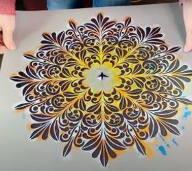 how to refresh a table with the easiest texture paste recipe, Placing a mandala stencil on the top of a coffee table