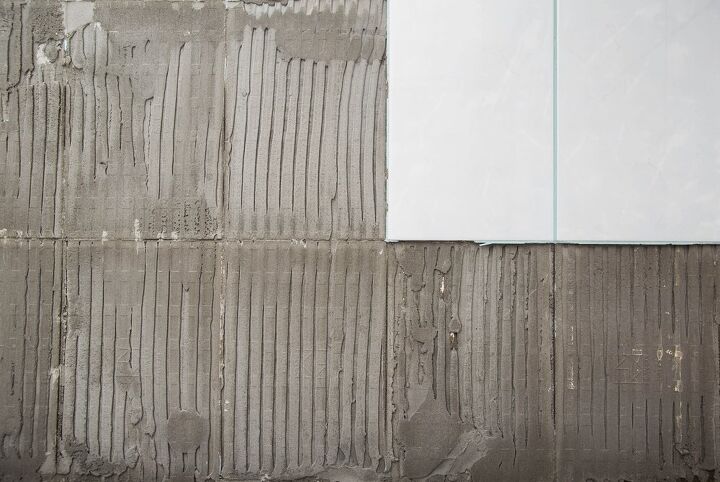 how to remove tile backsplash and replace drywall if needed, wall with adhesive and two white tiles